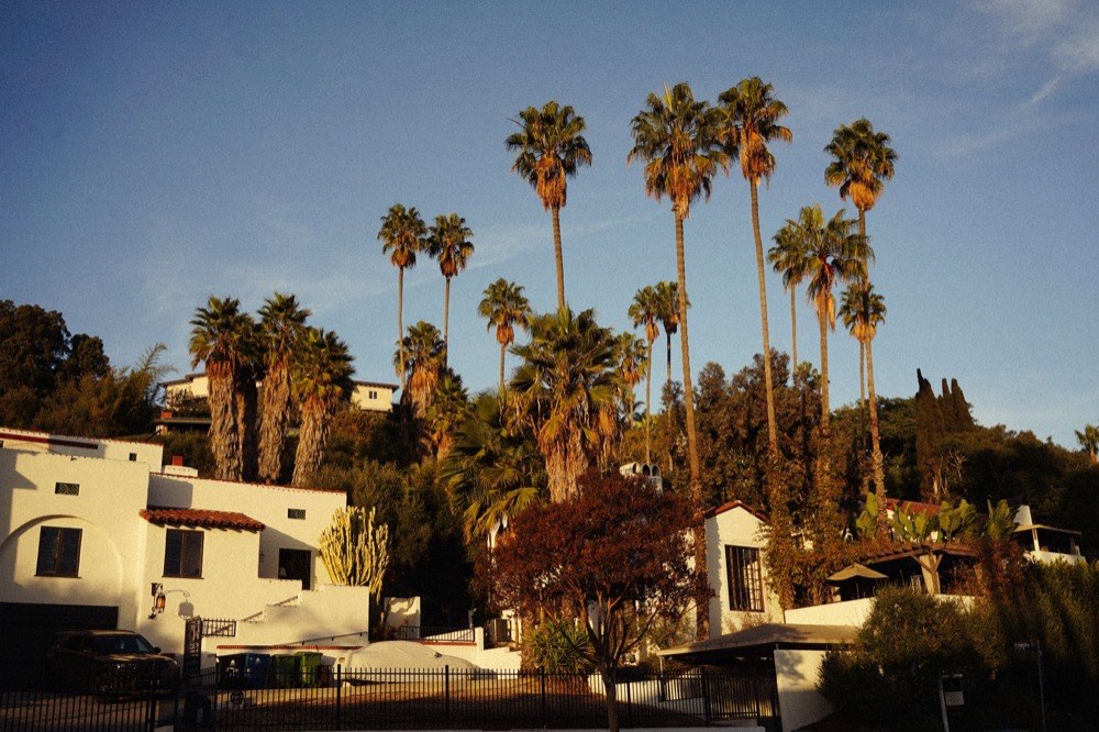 Southern California Spanish style homes with palm trees