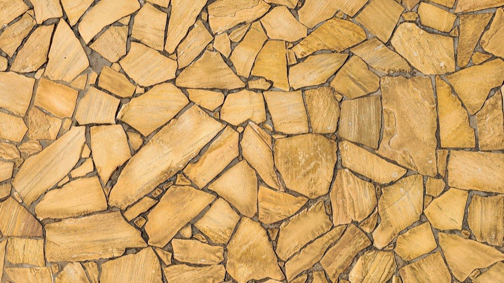 Golden travertine flagstone paving